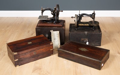 Lot 167 - A Wilcox & Gibbs sewing machine, cased, with...