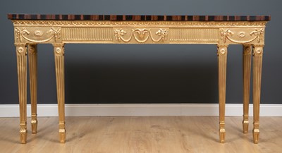 Lot 177 - A coromandel topped giltwood side table with...
