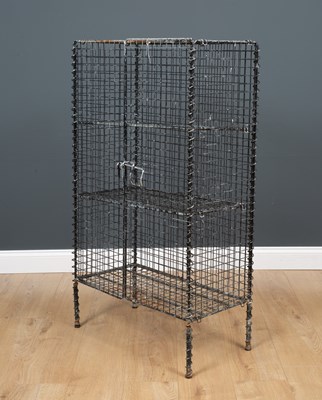 Lot 178 - A black painted three tier wirework locker...