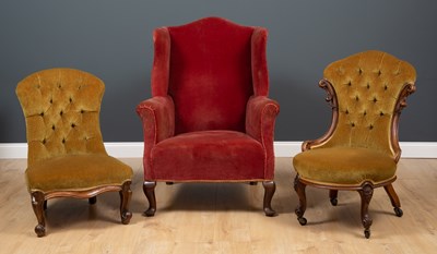 Lot 142 - A Victorian walnut framed button upholstered...