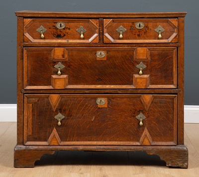 Lot 146 - A 17th century oak chest of two short and two...