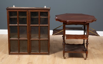 Lot 148 - An 18th century oak wall cupboard with twin...
