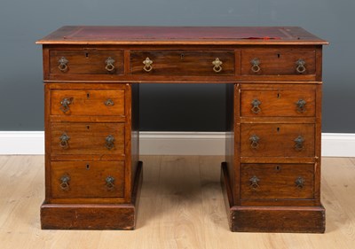 Lot 489 - A Victorian mahogany pedestal desk with a red...