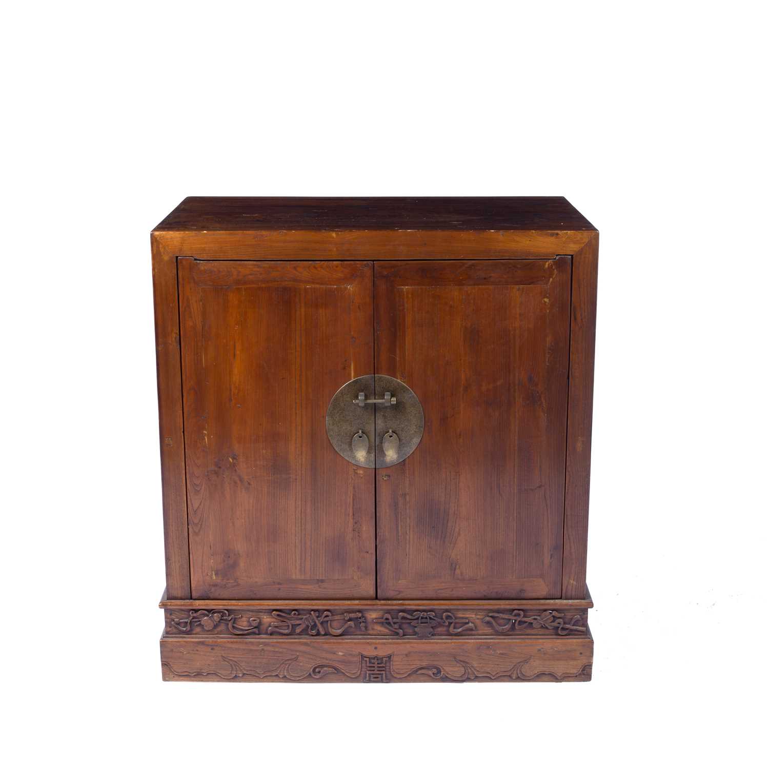 Lot 176 - Elm side cupboard Chinese, with carved frieze...