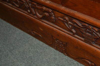 Lot 176 - Elm side cupboard Chinese, with carved frieze...