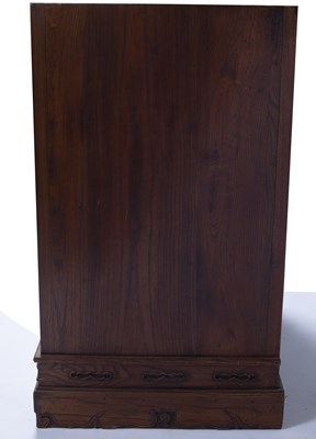 Lot 176 - Elm side cupboard Chinese, with carved frieze...