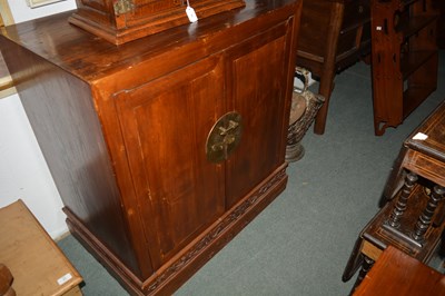 Lot 176 - Elm side cupboard Chinese, with carved frieze...