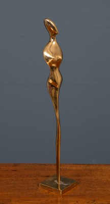 Lot 187 - A bronzed abstract figurine of an elongated...