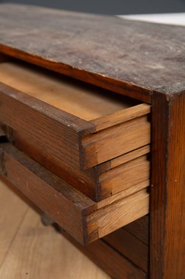 Lot 230 - An antique elm child's school desk, the...