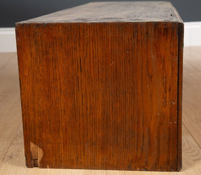 Lot 230 - An antique elm child's school desk, the...