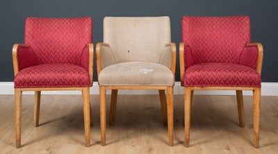Lot 508 - A set of three upholstered tub chairs each...