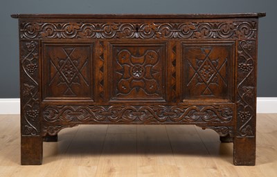 Lot 290 - An 18th century oak coffer with a triple...