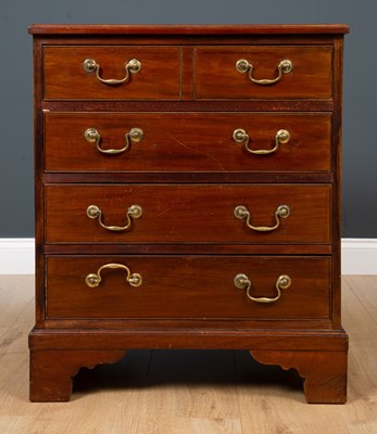 Lot 238 - A Georgian style mahogany chest of four long...