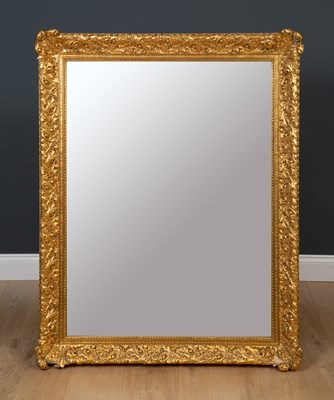 Lot 239 - A gilded gesso framed wall mirror 96cm wide x...