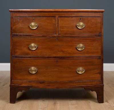 Lot 243 - A 19th century mahogany bow fronted chest of...