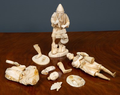 Lot 64 - Three late 19th century Japanese carved ivory...