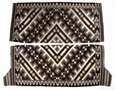 Lot 183 - Two Navajo type blankets of brown ground with...