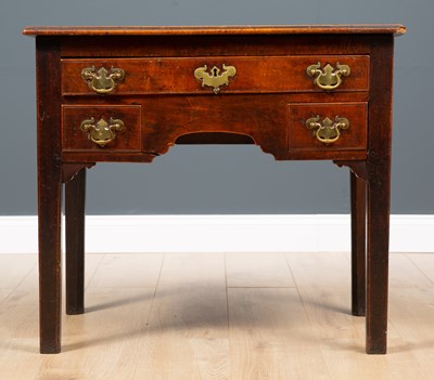 Lot 326 - An 18th century fruitwood three drawer side...