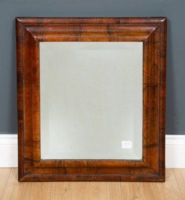Lot 336 - An 18th century walnut cushion moulded wall...