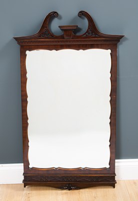 Lot 342 - An Edwardian mahogany framed wall mirror with...