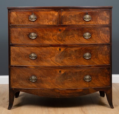 Lot 343 - A 19th century mahogany bow fronted chest of...