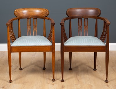 Lot 345 - A pair of Edwardian elbow chairs with pierced...