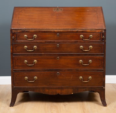 Lot 349 - A George III mahogany bureau, the fall front...