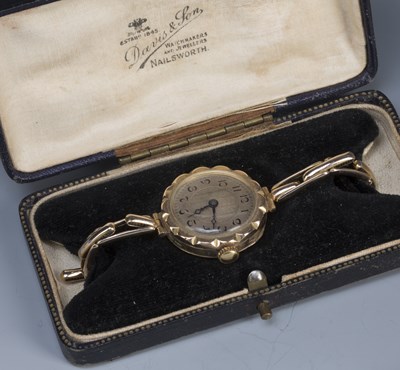 Lot 215 - Four vintage ladies gold cased watches one in...