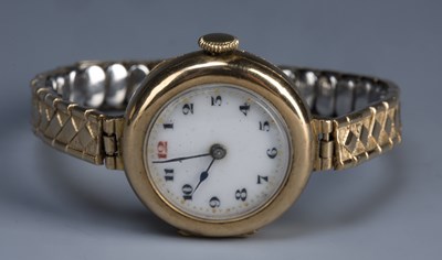 Lot 215 - Four vintage ladies gold cased watches one in...