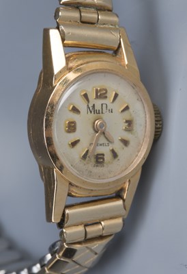 Lot 215 - Four vintage ladies gold cased watches one in...