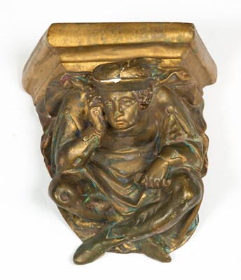 Lot 281 - A gilt painted plaster corbel of a seated man...