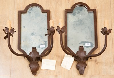 Lot 295 - A pair of cast iron mirror backed two light...