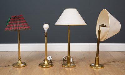 Lot 296 - A pair of brass table lamps on circular bases,...