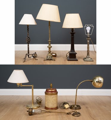Lot 298 - A collection of table lamps to include a brass...
