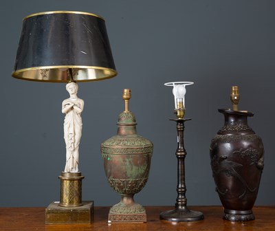 Lot 299 - A group of classical style table lamps; two...
