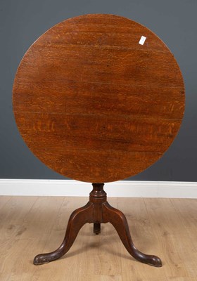 Lot 305 - A Georgian mahogany tilt top tripod table on...