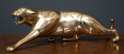 Lot 494 - A brass sculpture of a leopard, 65cm long x...