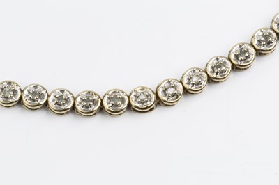 Lot 96 - A 9ct gold fancy-link bracelet, of snake-link...