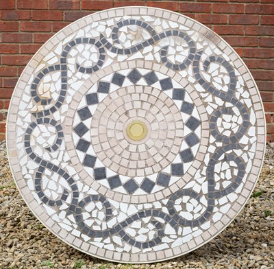 Lot 676 - A modern circular garden table with mosaic...