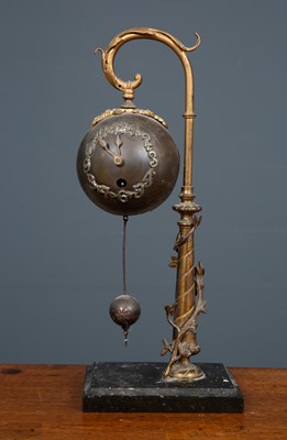 Lot 324 - A brass German mantel clock, the face marked...