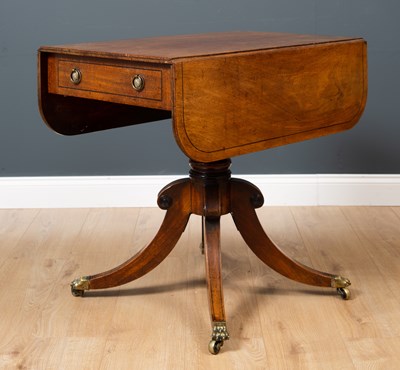 Lot 366 - A Regency mahogany sofa table with a single...