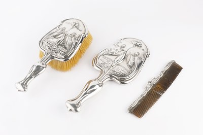 Lot 370 - An Edwardian silver Art Nouveau style three...