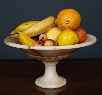 Lot 402 - An alabaster tazza containing fourteen mostly...