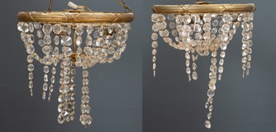 Lot 405 - A pair of brass and cut glass electroliers...