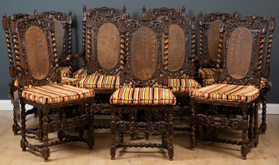 Lot 83 - A set of twelve Carolean style chairs with...