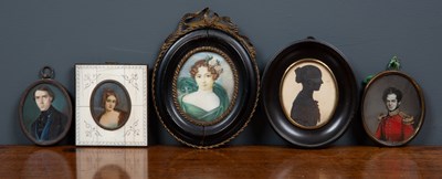 Lot 60 - A group of four miniature portrait paintings...