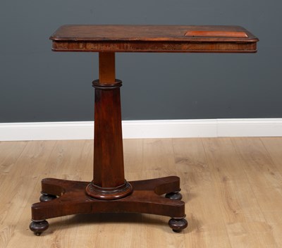 Lot 383 - A Victorian mahogany reading table with an...