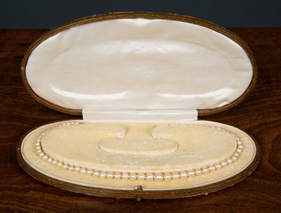 Lot 23 - A cultured pearl necklace with gem set...
